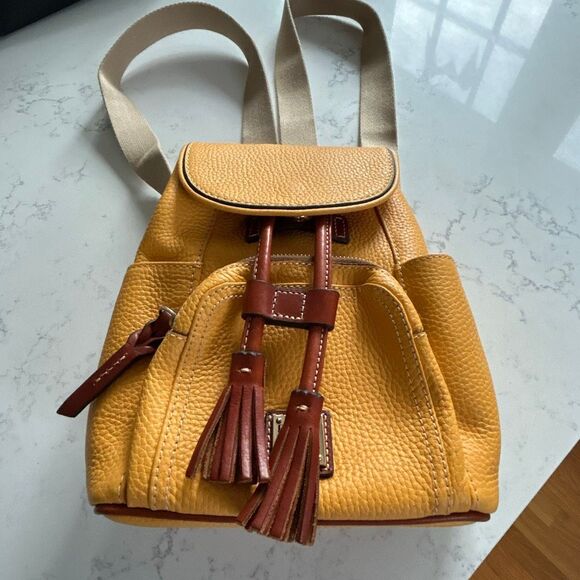 Dooney & Bourke Handbags - Dooney & Burke Yellow Leather Backpack